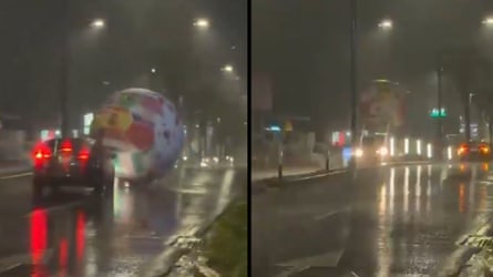 Giant World Cup ball blows through streets of El Salvador