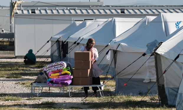 A woman arrives at the Nea Kavala camp in northern Greece on 3 September 2019