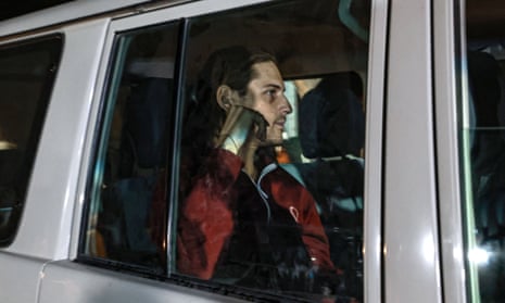 Roni Krivoy, 25, is taken towards the Rafah border crossing with Egypt after his release by Hamas on Sunday.