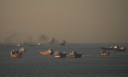 Vessels anchored in the strait of Hormuz, as seen from Musandam, Oman.