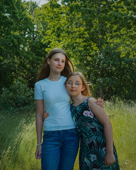 Herman Afzelius and Ninnie Wikström’s daughters, Nahla (left) and Lovis, in the garden of their home in Kallinge.