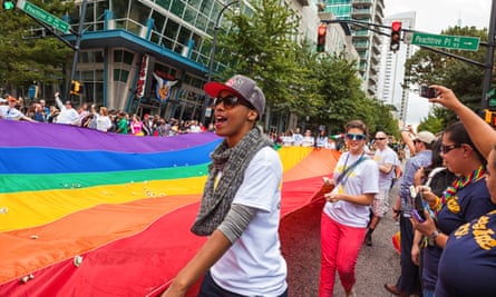Atlanta Pride Parade passes down Peachtree Street.