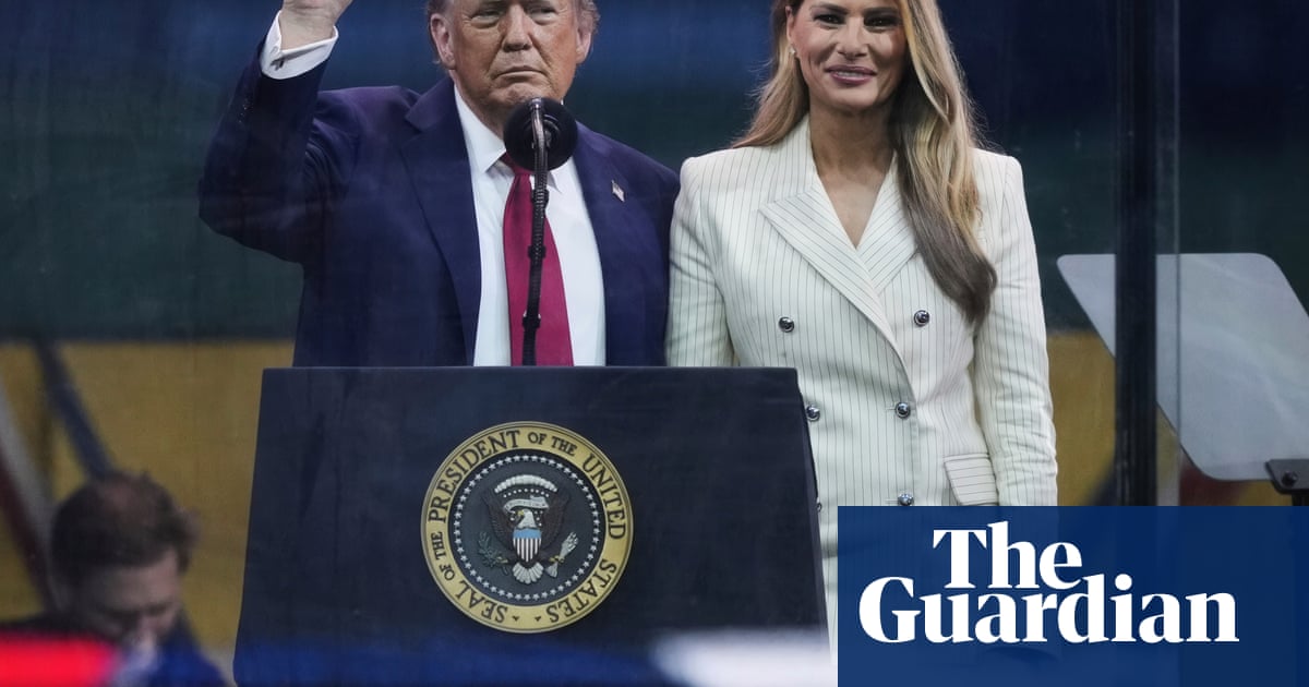 Gathering stormclouds can't wipe smile from Trump's face as long-held dream of military parade is realised