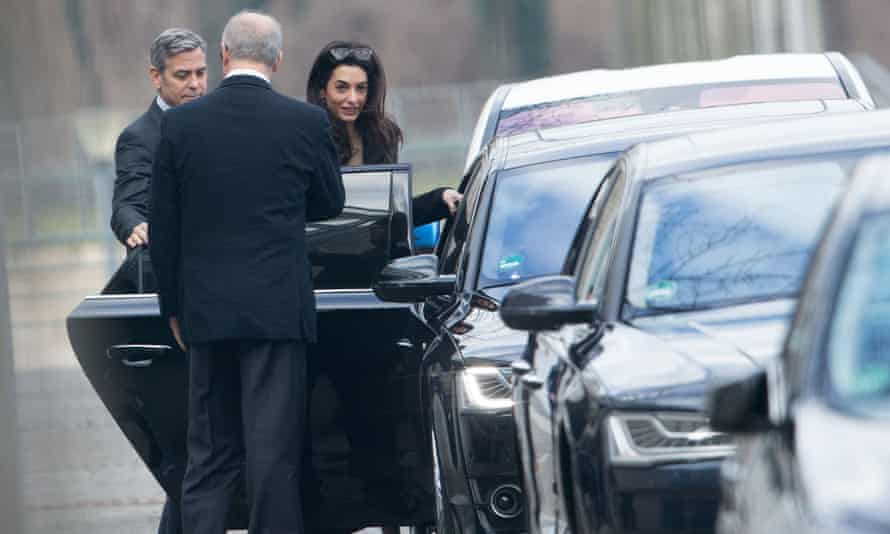 George and Amal Clooney leave the chancellery in Berlin after the meeting.
