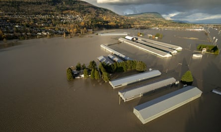 Partially submerged barns in Abbotsford, British Columbia