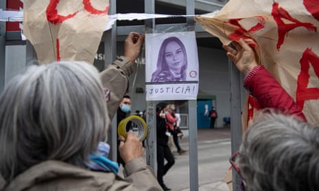 Women place a photograph of journalist Francisca Sandoval outside the Hospital of Urgencias y Asistencia Publica in Santiago, on 12 May.
