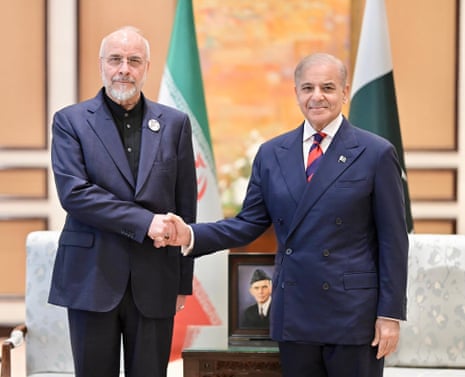 Iran’s parliamentary speaker Mohammad Bagher Ghalibaf (L) shakes hands with Pakistan’s prime minister Shehbaz Sharif (R) before the US-Iran peace talks in Islamabad on 11 April, 2026.