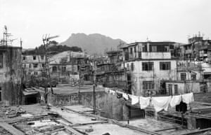 Lion Rock seen from Kowloon Walled Cityâs Rooftops, Hong Kong, 1987Keeping Lee: âMy interest in the Walled City began with a book titled Chasing the Dragon that I discovered while studying in London. It tells the story of an English woman helping drug addicts in the Walled City, which ignited my desire to visit and take photos. In 1987, I went for the first timeâ