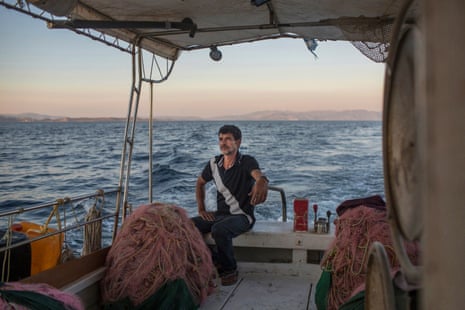 Mohammed El-Hamisi, an Egyptian fisherman on his boat, with which he saved 48 people from the fires in Greece in July 2018