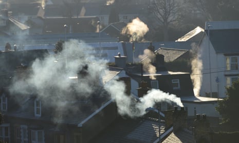 Steam and smoke from chimneys on a cold morning