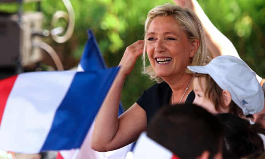 Front National leader Marine Le Pen smiles during a political rally in Brachay, northeastern France.