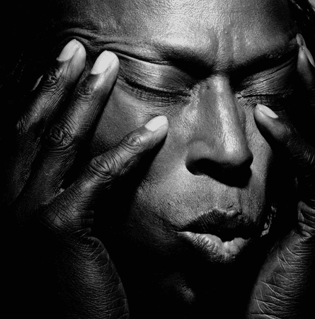 Closeup of the face of musician Miles Davis