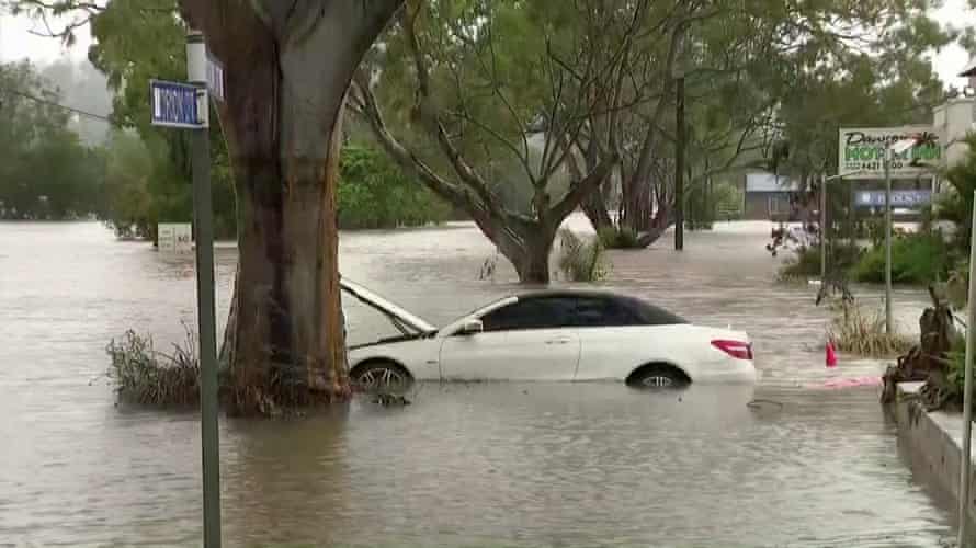 A car is submerged in floodwater in Lismore in March.