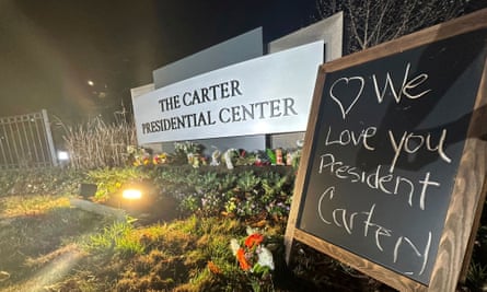 Tributes to Jimmy Carter outside the Carter Presidential Center, Atlanta, 29 December 2024.