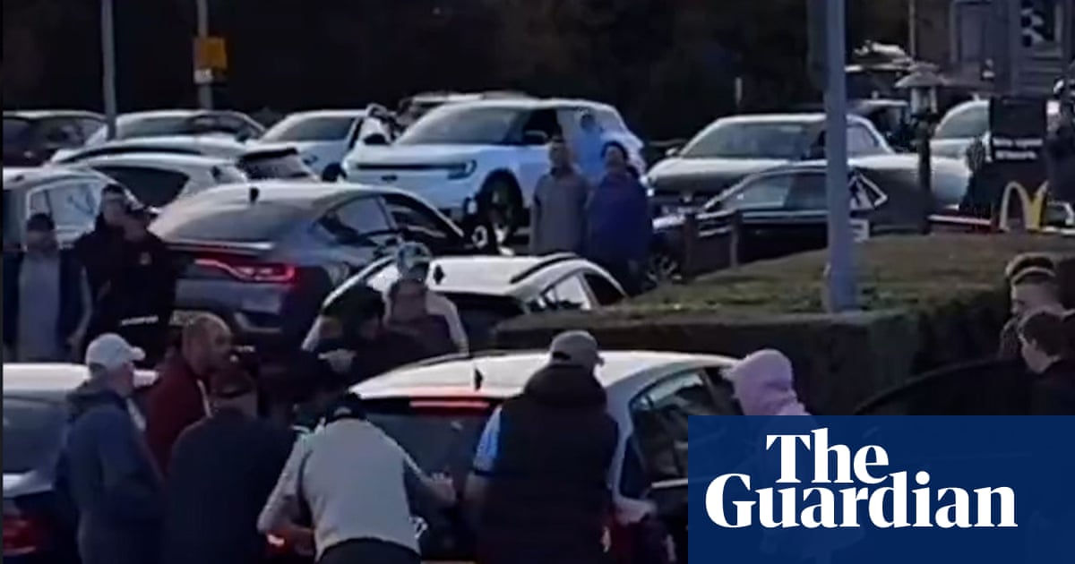 Men attack two cars in apparent anti-migrant vigilante violence in Belfast