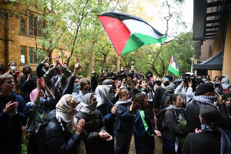Students chant following a press conference about a pro-Palestine encampment at the University of Melbourne.