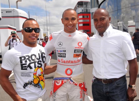 With his father, Anthony, and his half-brother, Nicholas, who is also a racing driver, at Silverstone in 2010.