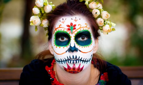 A woman celebrates the Day of the Dead in Mexico