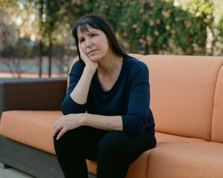 a woman sitting on a couch