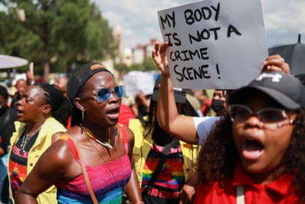 Protesters sing and chant during a demonstration