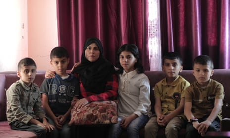 Ghada Hammad and her children.  The family live in Khan Younis, on the Gaza Strip.