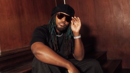 Leon Thomas posing for a photo