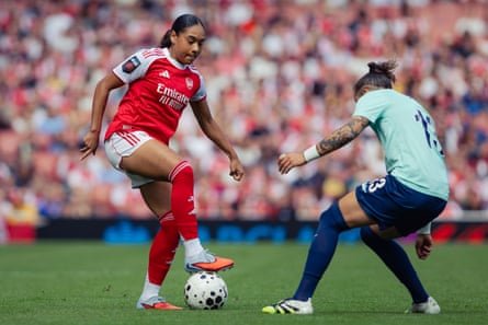 Olivia Smith successful action for Arsenal.
