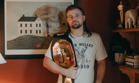 Scott Salvadore with his boxing-style belt featuring the name of his mullet: The Lord’s Drapes.