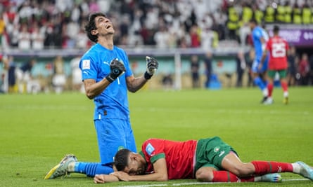 Yassine Bono and Achraf Hakimi celebrate Morocco’s victory against Portugal.