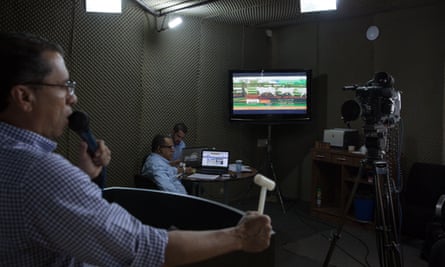 Adriano Barbosa, auctioneer, at work at the virtual auction Estancia Bahia, where animals are sold by television to buyers from all over Brazil