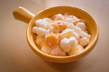 Creamy ambrosia salad with marshmallows, pineapple and mandarin orange.