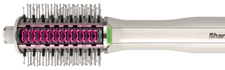 The white, black and pink Shark SmoothStyle Hot Brush on a white background