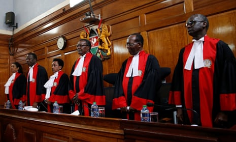Kenya’s supreme court judges arrive at the courtroom before delivering their ruling.