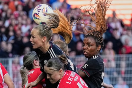 Magdalena Eriksson, left, contests a headed challenge against Union Berlin.
