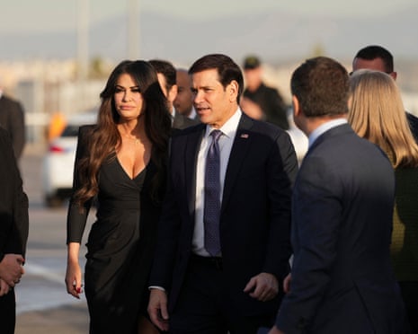US secretary of state Marco Rubio flanked by US ambassador to Greece Kimberly Guilfoyle arrives to board a plane at Eleftherios Venizelos International Airport near Athens.