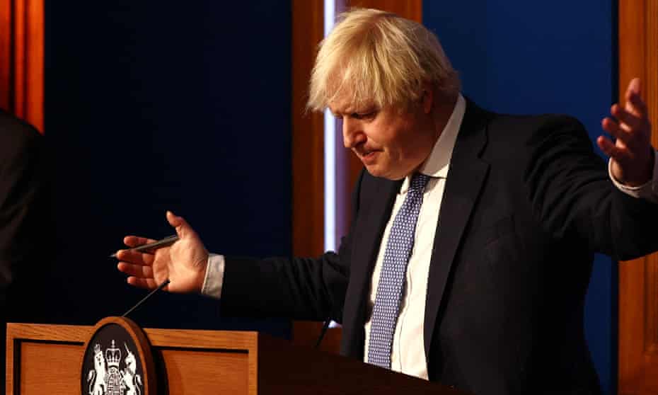 Boris Johnson gestures during a Covid-19 press conference in the Downing Street briefing room on Wednesday.