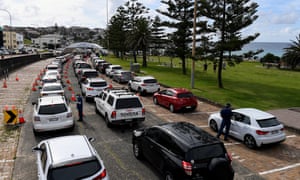 People queue in their cars for Covid tests at a drive-through clinic at Bondi Beach in Sydney.