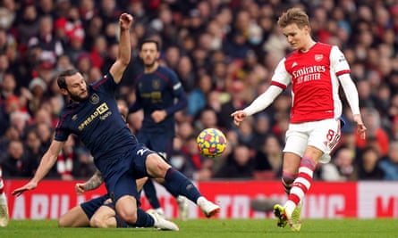 Burnley’s Erik Pieters and Arsenal’s Martin Ødegaard battle for the ball
