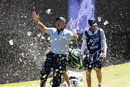 Patrick Reed reacts to his hole-in-one at last year’s LIV Golf tournament in Adelaide.