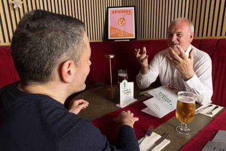 Martyn and Alan chatting across a restaurant table