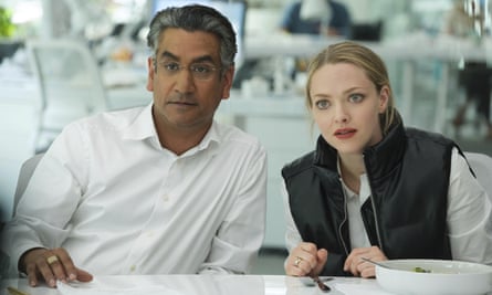 Naveen Andrews and Amanda Seyfried in The Dropout