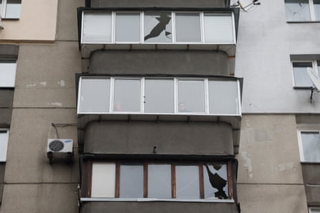 A view of damaged windows on a building in Kyiv