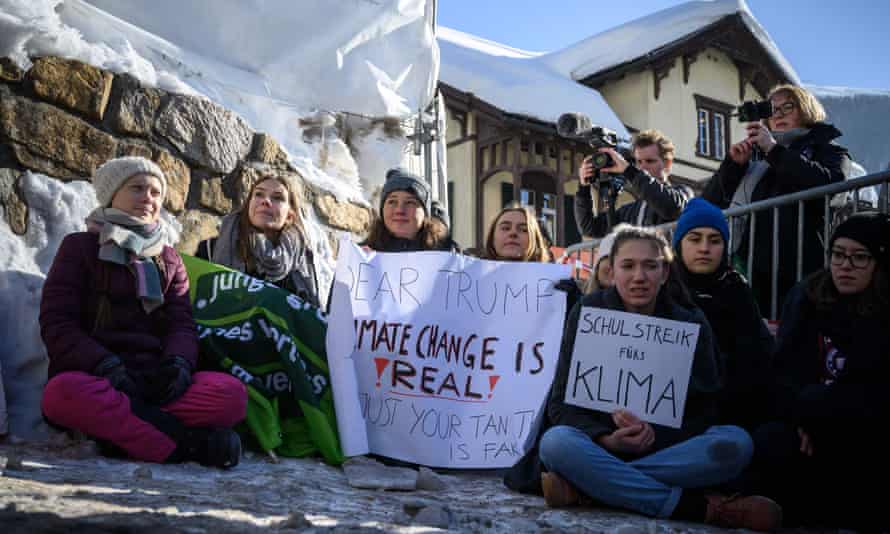 Greta Thunberg (left) takes part in a ‘school strike for climate’ at the World Economic Forum in Davos, Switzerland.