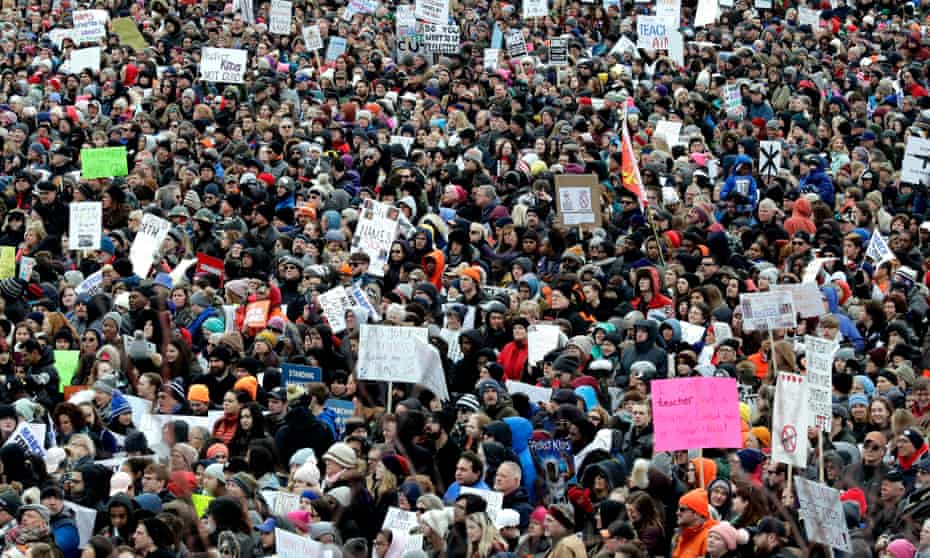 Demonstrators attend a March for Our Lives rally in support of gun control.