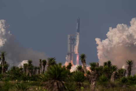 SpaceX's Starship rocket launches from Starbase, Texas, with fiery exhaust and billowing smoke