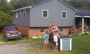 Brandon Dennison, 29, with his six children at home in Thurman in Gallia county, Ohio. Courtesy of the family
