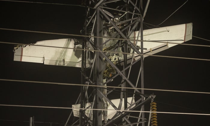 Two people rescued from plane that crashed into power lines in Maryland (theguardian.com)