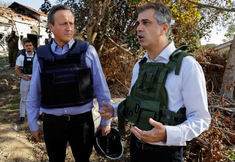 British foreign secretary David Cameron and Israeli foreign minister Eli Cohen visit kibbutz Be’eri.