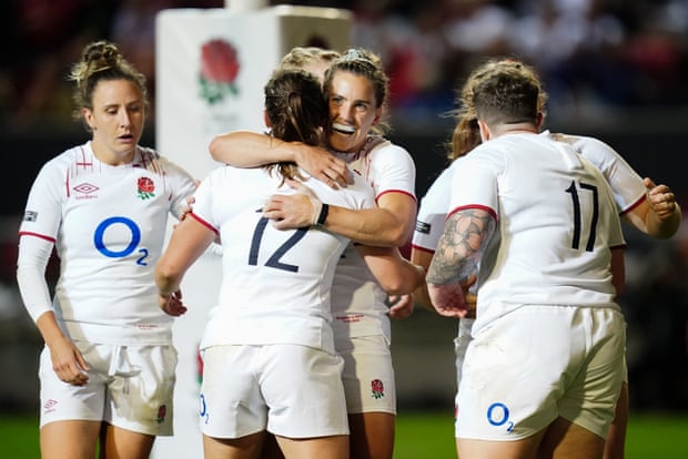 England’s Helena Rowland celebrates with Claudia MacDonald after scoring a try.