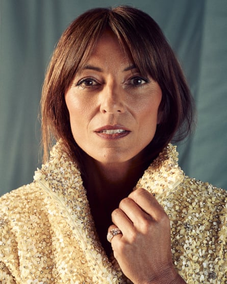 Closeup of McCall in cream sequined coat